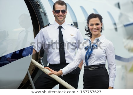 Foto stock: Pilot And Hostess