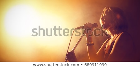 Zdjęcia stock: Female Singer With Microphone