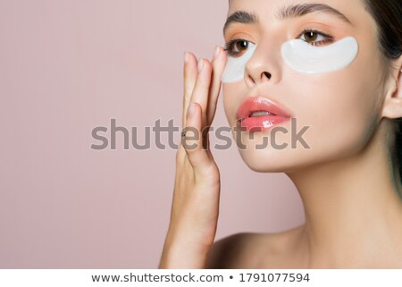 Foto stock: Close Up Of Woman With Collagen Facial Mask