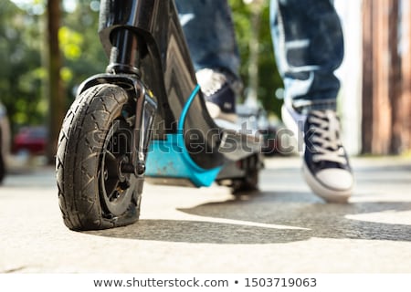 [[stock_photo]]: Flat Tire On E Scooter