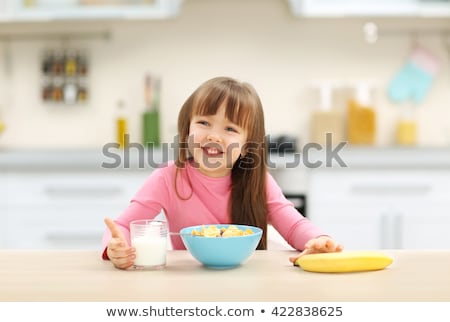 Сток-фото: Little Girl Having Breakfast