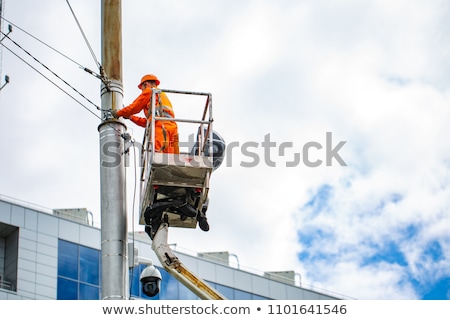 ストックフォト: Electrician Working At Height