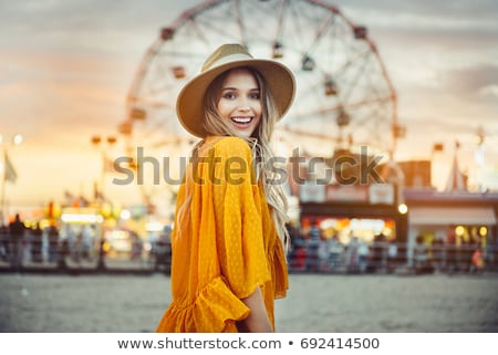 [[stock_photo]]: Portrait Of A Female Smiling In A Park