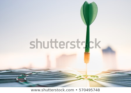 Stock photo: Dartboard With Dart In Aim