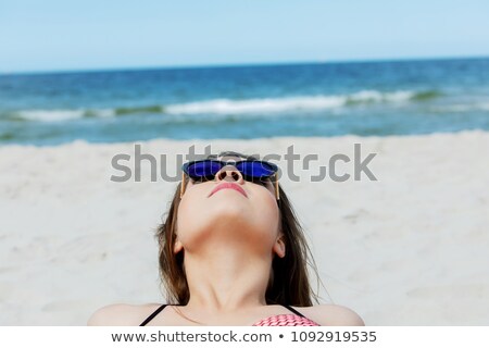 Stock fotó: Laughing Woman Taking A Sand Bath