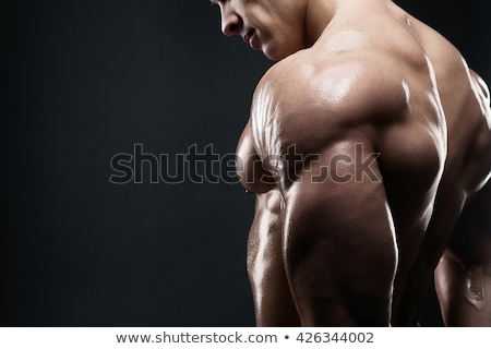 Stockfoto: Muscled Male Model Showing His Back