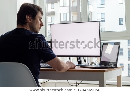 Stockfoto: Executive Using Desktop Computer In Office