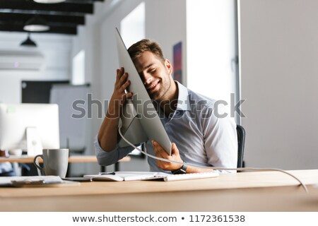 Stockfoto: Pleased Male Manager Having Fun With Computer