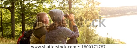 Сток-фото: Man Looking In Distance With Help Of Binoculars