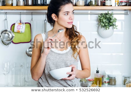 Stockfoto: Young Woman Enjoying Breakfast