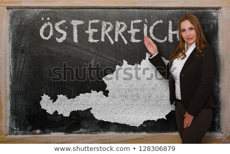 Teacher Showing Map Of Austria On Blackboard [[stock_photo]] © vepar5