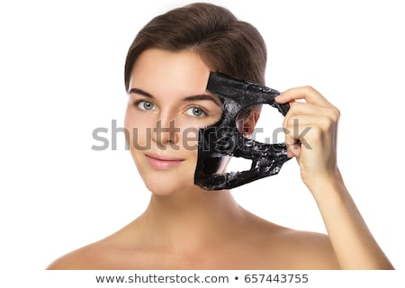 Stock fotó: Woman Removing Peeling Mask From Her Face