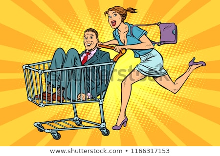 Stok fotoğraf: Pop Art Woman With Man In A Shopping Trolley