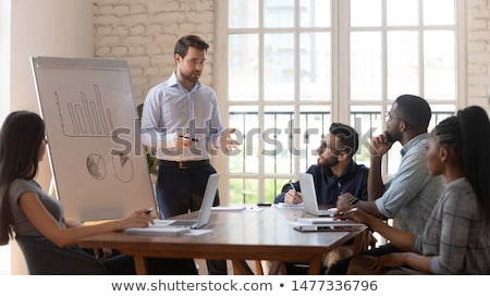 Foto d'archivio: Business Seminar Businesswoman And Man Presenters