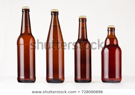 Stock photo: Brown Glass Beer Bottles On Table