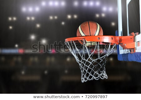 Basketball Ball And Net On Grey Background [[stock_photo]] © dotshock