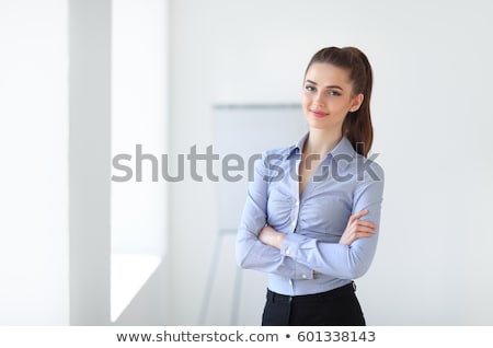 [[stock_photo]]: Smiling Business Woman Folded Arms