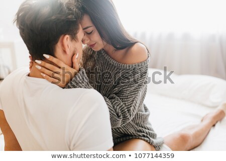 Stock photo: Man Holding Womans Face