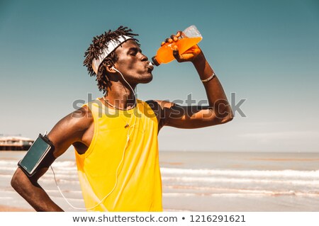 Stock fotó: Black Motivated Man After Running At The Beach