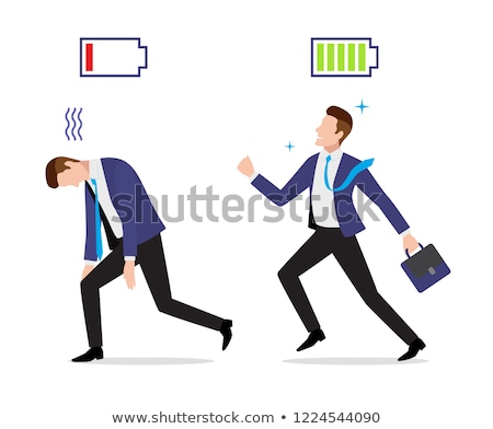 Foto stock: Stressed Overworked And Vigorous Businessman With Charged And Discharged Battery Icon