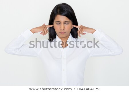 ストックフォト: Businesswoman With Her Fingers In Her Ears
