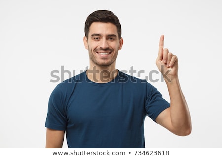 Stockfoto: Casual Young Man Pointing Up