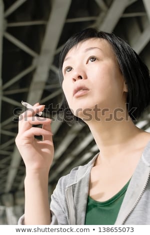 Chinese Woman With Cigar Foto d'archivio © elwynn