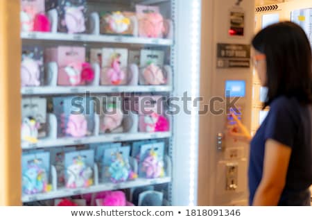 Foto stock: Cartoon Asian Business Woman In An Airport