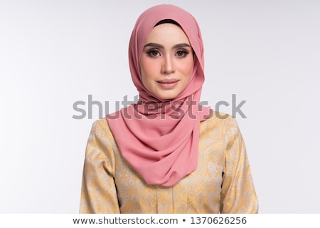 Stock fotó: A Young Muslim Woman In Traditional Clothes Isolated