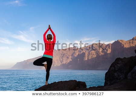 Stock fotó: Woman Meditating In Yoga Vrksasana Tree Pose