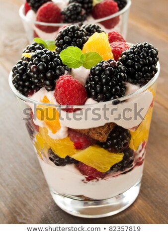 Glasses With Fruit And Yogurt Desserts Stok fotoğraf © AGfoto