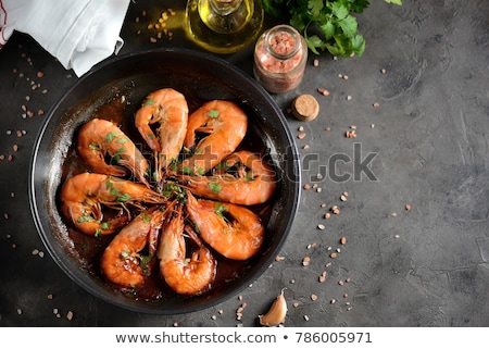 ストックフォト: Shrimps Roasted On Frying Cast Iron Pan