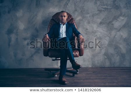 Stok fotoğraf: Portrait Of Smart Young Man Wearing Black Tuxedo And Glasses