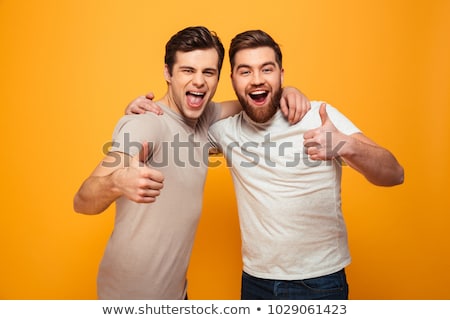 Сток-фото: Happy Friends Showing Thumbs Up