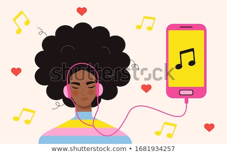 Stock foto: Teenage Girls Listening To Music From Smartphone