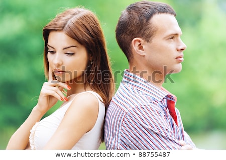 Foto stock: Man And Woman Back To Back