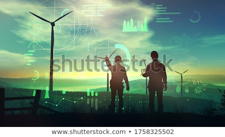 Foto stock: Project Developer In A Green Landscape With Windmills