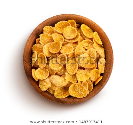 Stockfoto: Golden Corn Flakes In White Bowl Isolated Top View Cereals
