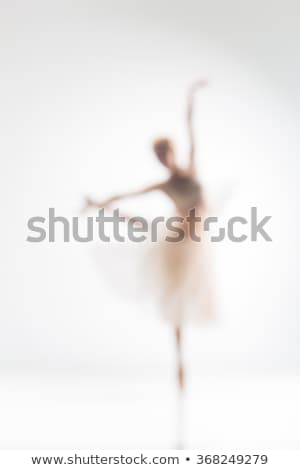 ストックフォト: Blurred Silhouette Of Ballerina On White Background