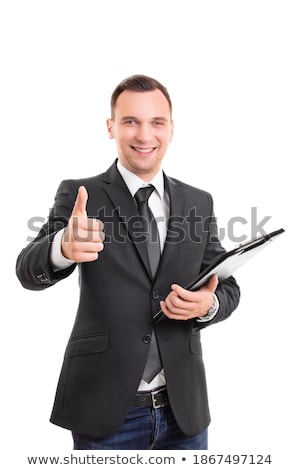 Stok fotoğraf: Businessman With Clipboard Giving Thumb Up