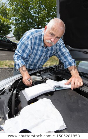 Stock fotó: Older Man With Guidebooks