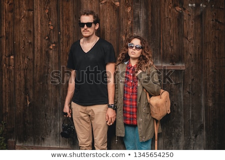 ストックフォト: Handsome Man Wearing Checkered Shirt In Wooden Rural House Interior