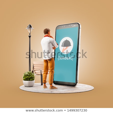 [[stock_photo]]: Man Messaging On Smartphone At Restaurant