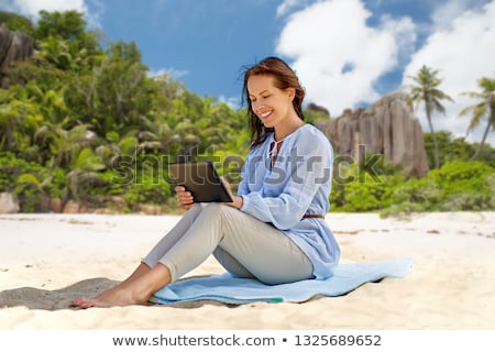 Stok fotoğraf: Happy Woman Over Tropical Beach Background