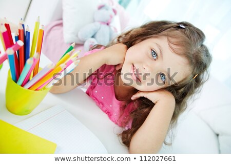 Sweet Little Girl Drawing Artwork With Crayons Сток-фото © Pressmaster