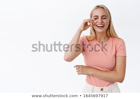 [[stock_photo]]: Portrait Of Cheeful Pretty Young Woman In Striped T Shirt