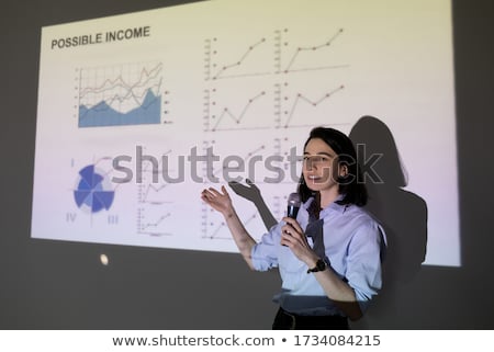 Indian Businesswoman Showing Financial Diagram Stockfoto © Pressmaster