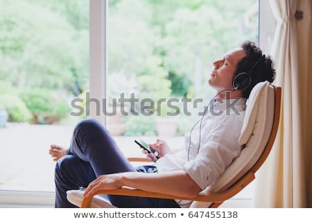 Foto stock: Sleeping Man With Mp3 Player