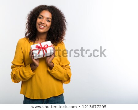 Stock foto: Black Woman Holding A Christmas Ornament