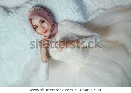 Stock photo: Beautiful Woman Lying On Bright Satin